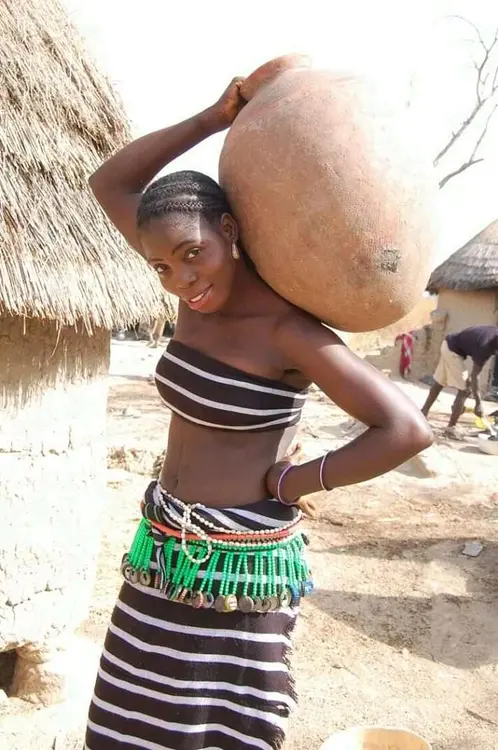 This girl carried Azagunu dance pot